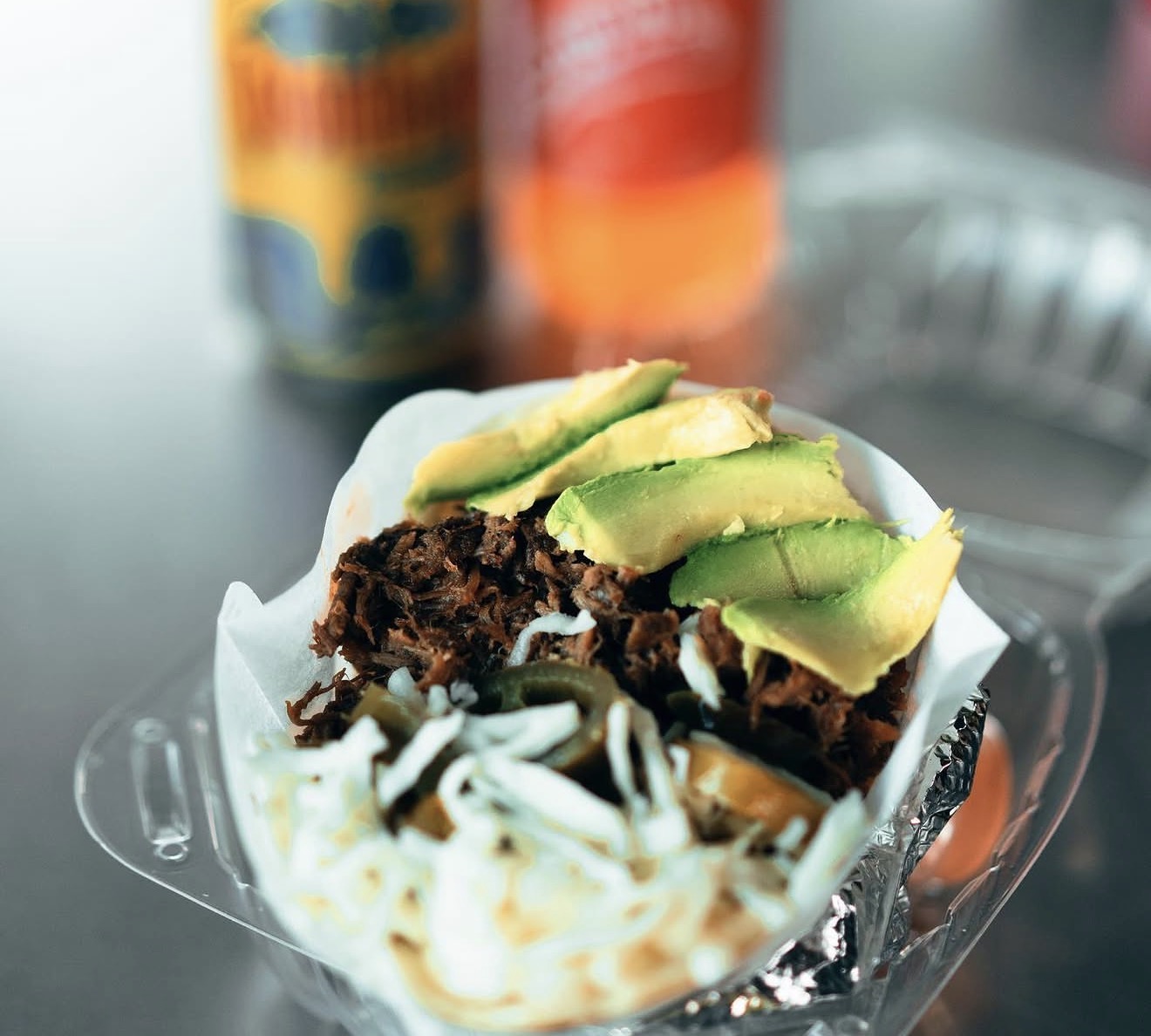 Arepa stuffed with shredded beef, avocado and cheese